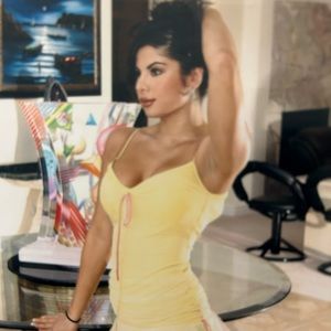 Yellow cocktail/party dress with multi colored layers.